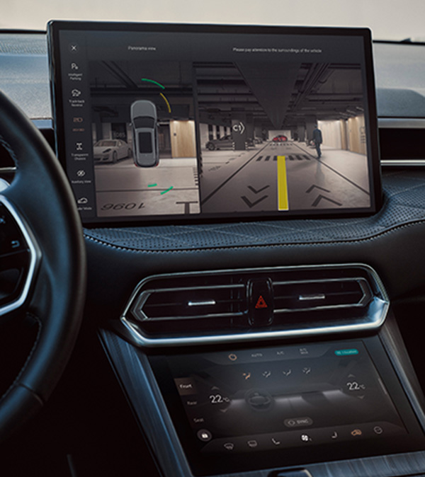 the interior of the wey coffee 01 car showing the steering wheel and the infotainment display